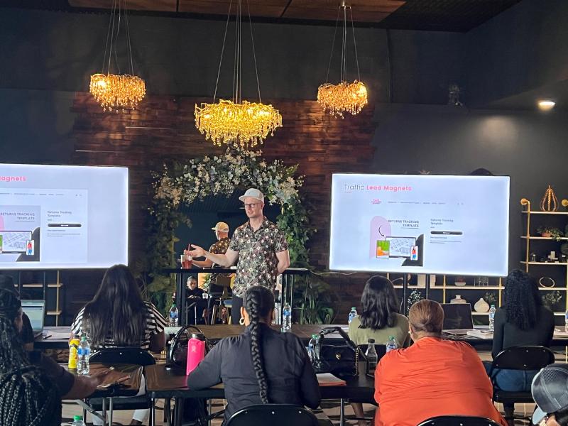 Mikey Moran teaching a hair business class to stylists and entrepreneurs