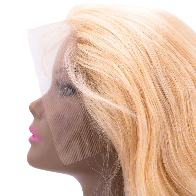 Up close view of lace on blonde body wave wig