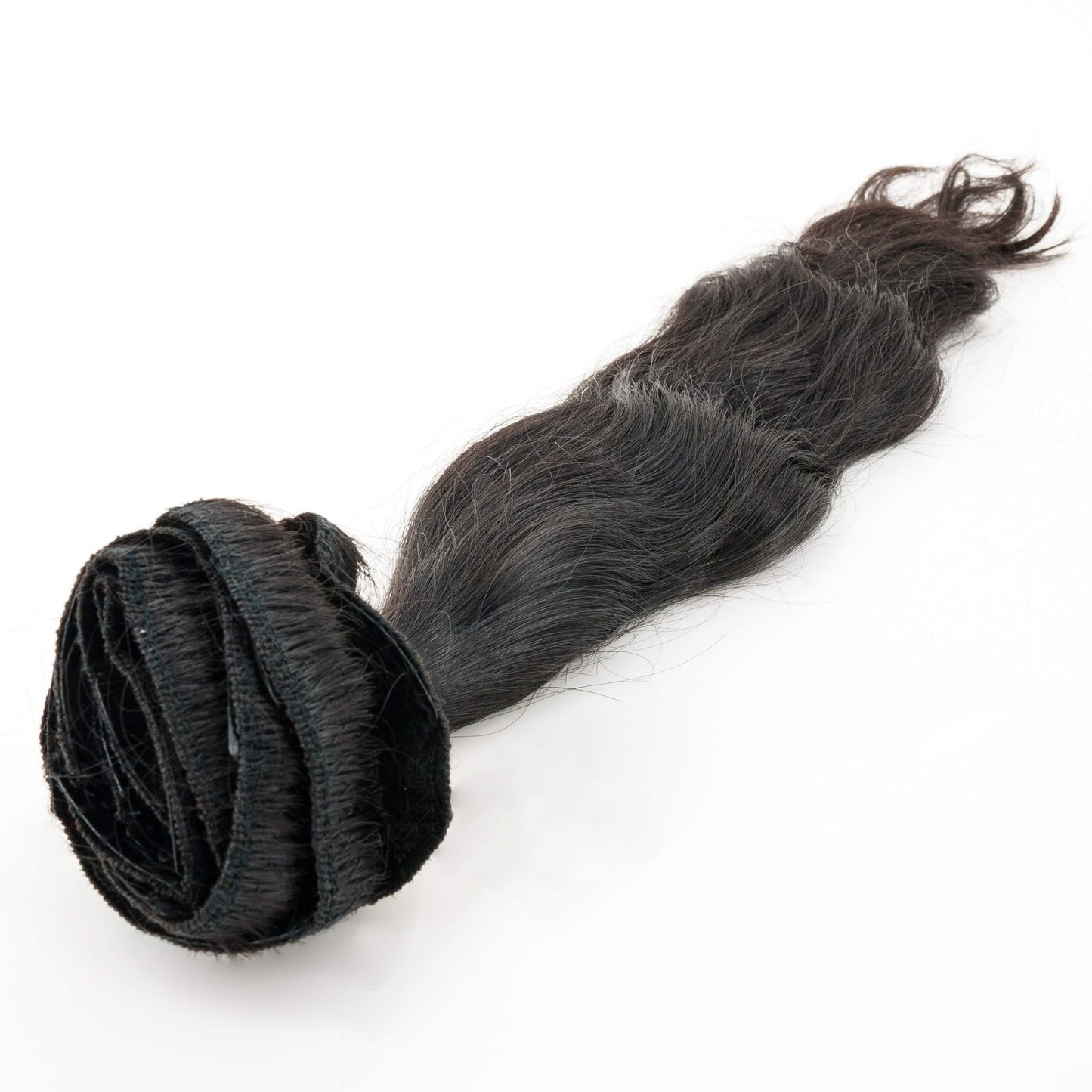 close up of Raw Indian Wavy Natural Black Clip-In Extensions