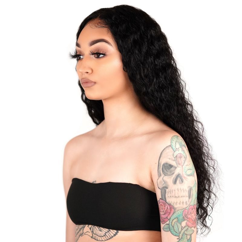 side view of model wearing deep wave lace front wig