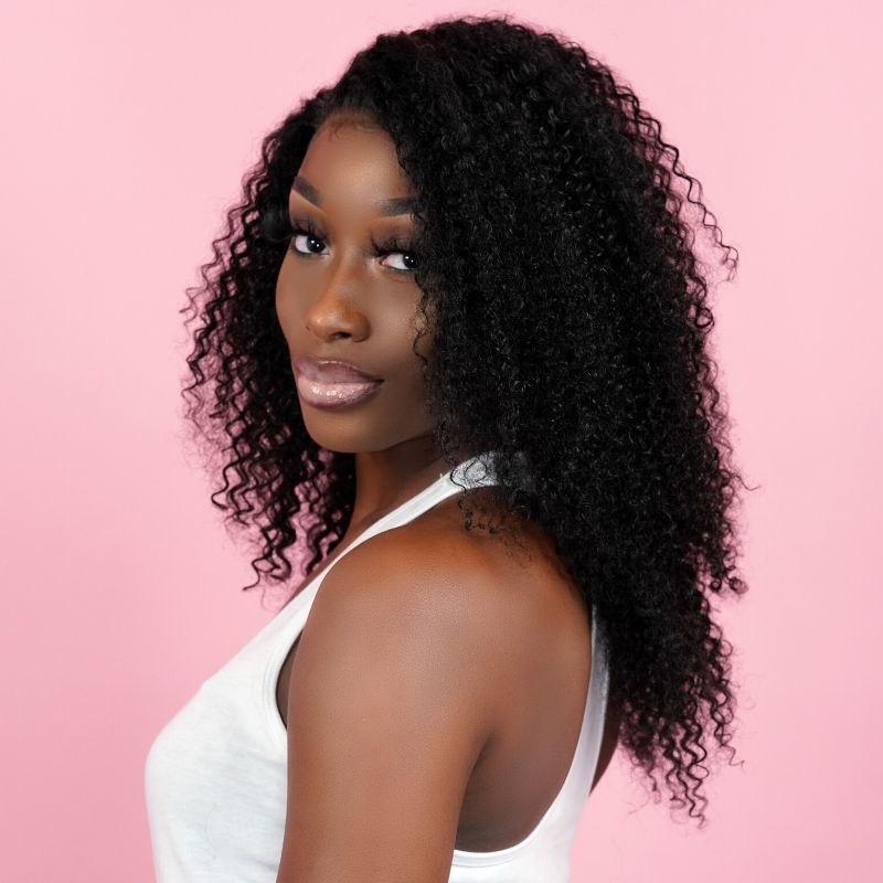 Model wearing Brazilian kinky curly extensions